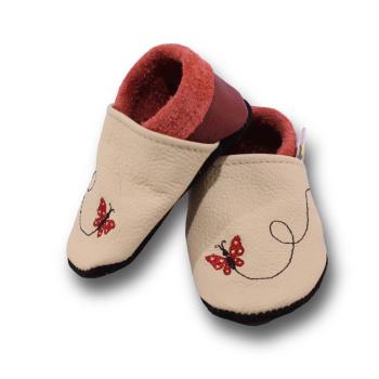 Krabbelschuhe Schmetterling im Flug auf beige