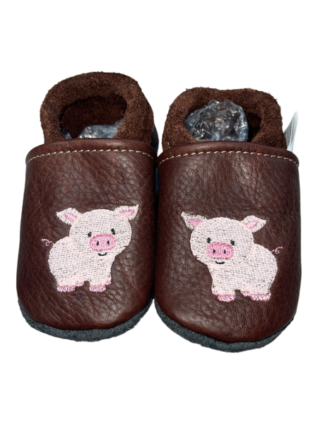 Lauflernschuhe Schwein auf braun