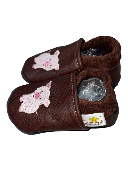 Lauflernschuhe Schwein auf braun