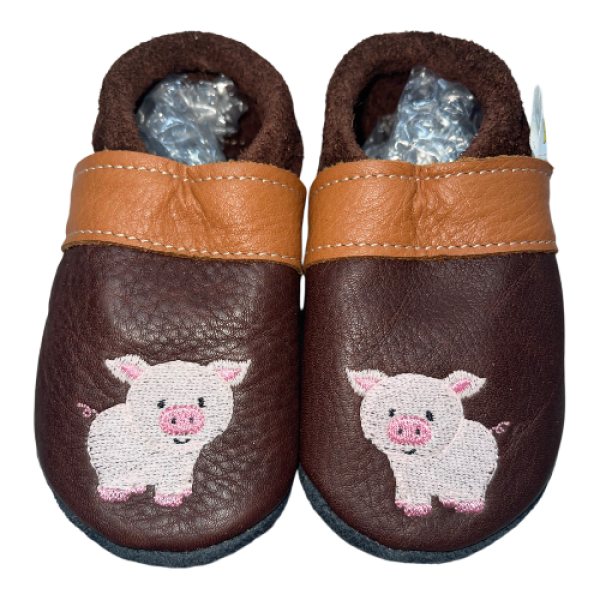 Krabbelschuhe Schwein auf braun
