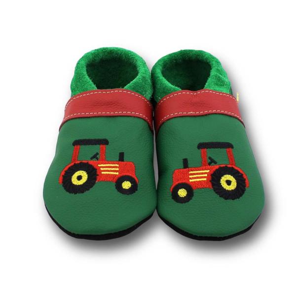 Lauflernschuhe roter Trecker auf grün