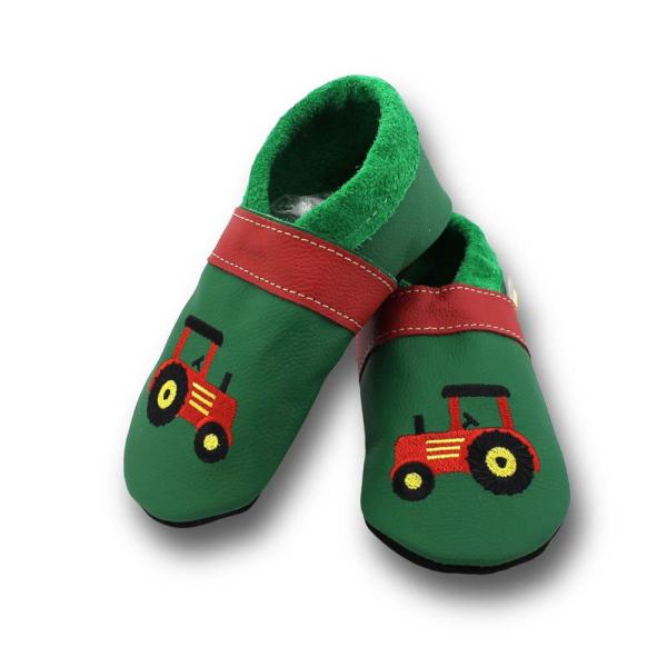 Lauflernschuhe roter Trecker auf grün