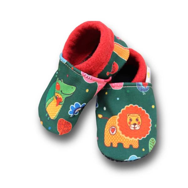 Vegane Lauflernschuhe Löwe & Kroko auf grün
