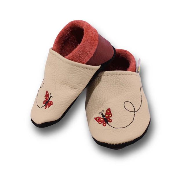 Krabbelschuhe Schmetterling im Flug auf beige